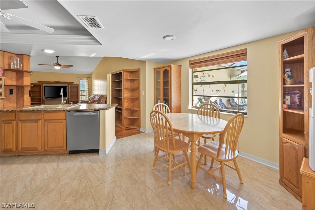 17413 Butler Road Fort Myers, FL 33967 - Photo 23 of 33 a dining room with furniture and window