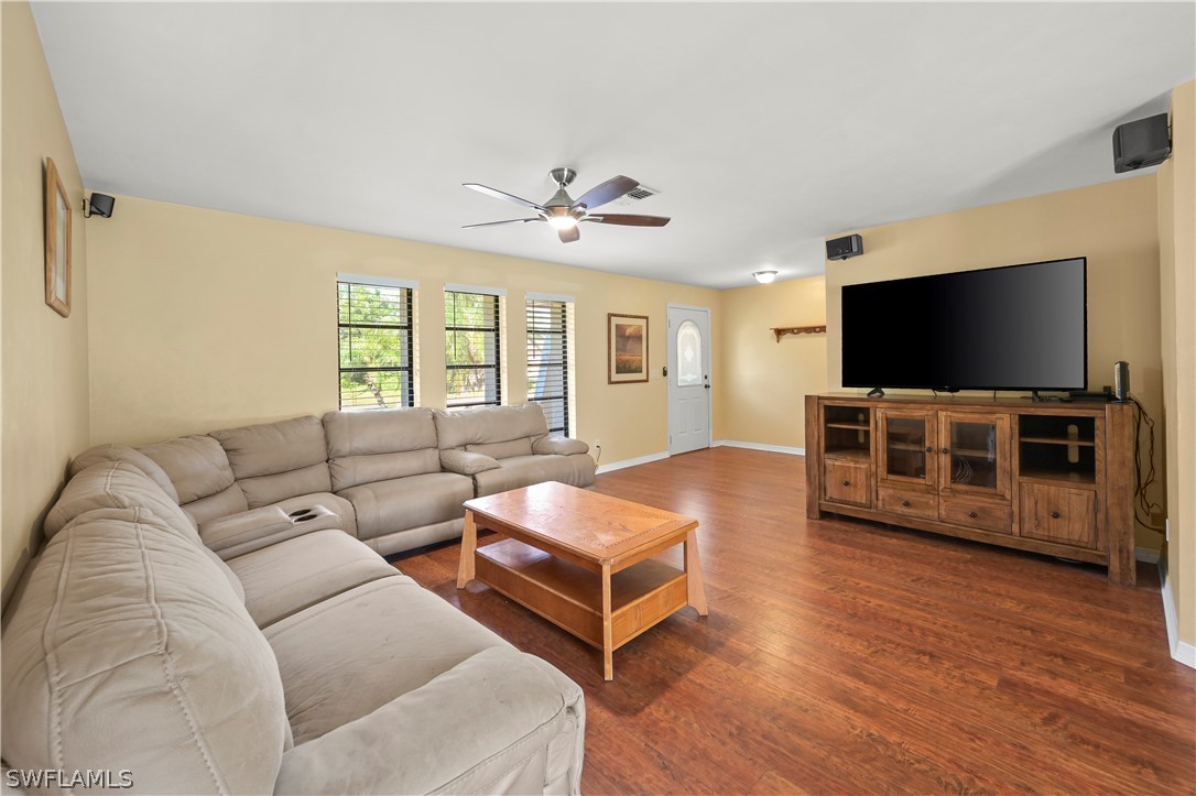 17413 Butler Road Fort Myers, FL 33967 - Photo 25 of 33 a living room with furniture and a flat screen tv