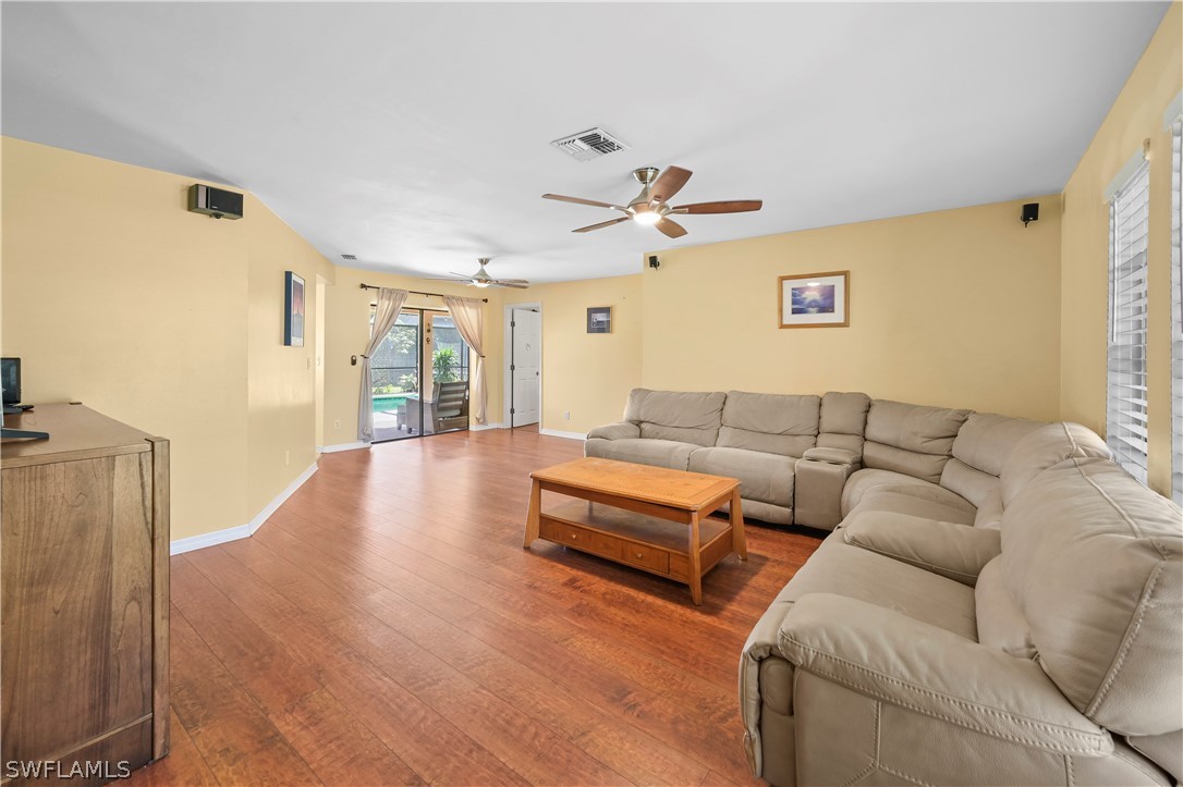 17413 Butler Road Fort Myers, FL 33967 - Photo 26 of 33 a living room with furniture and a large window