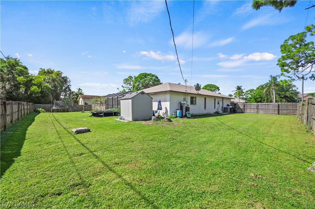 17413 Butler Road Fort Myers, FL 33967 - Photo 28 of 33 a view of a house with backyard and sitting area