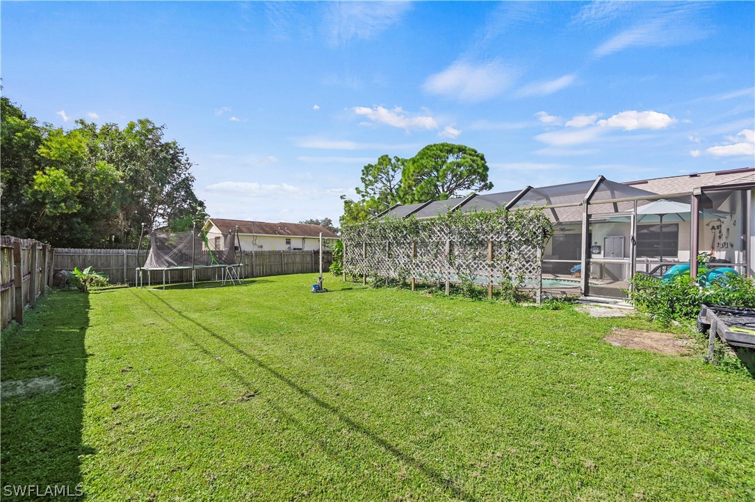17413 Butler Road Fort Myers, FL 33967 - Photo 29 of 33 a view of a garden with a building in the background