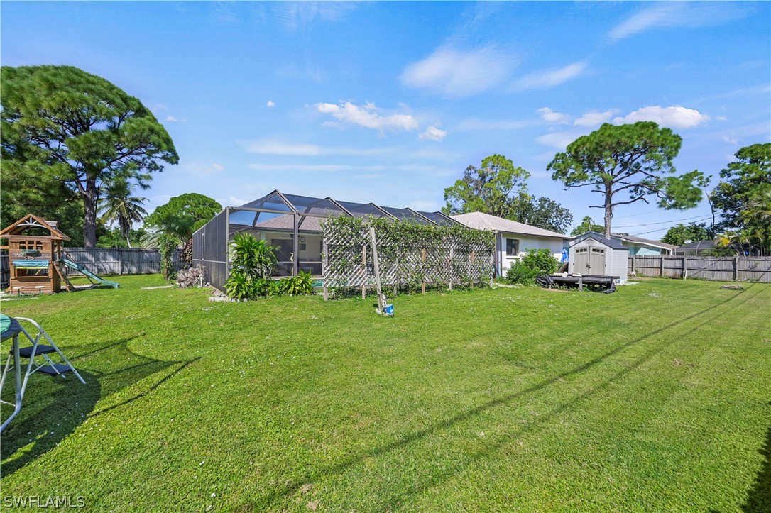 17413 Butler Road Fort Myers, FL 33967 - Photo 30 of 33 a front view of a house with garden
