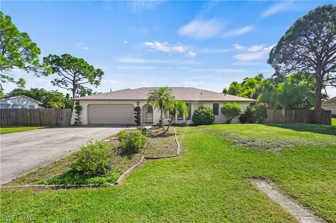 17413 Butler Road Fort Myers, FL 33967 - Photo 33 of 33 a view of a house with backyard and a garden
