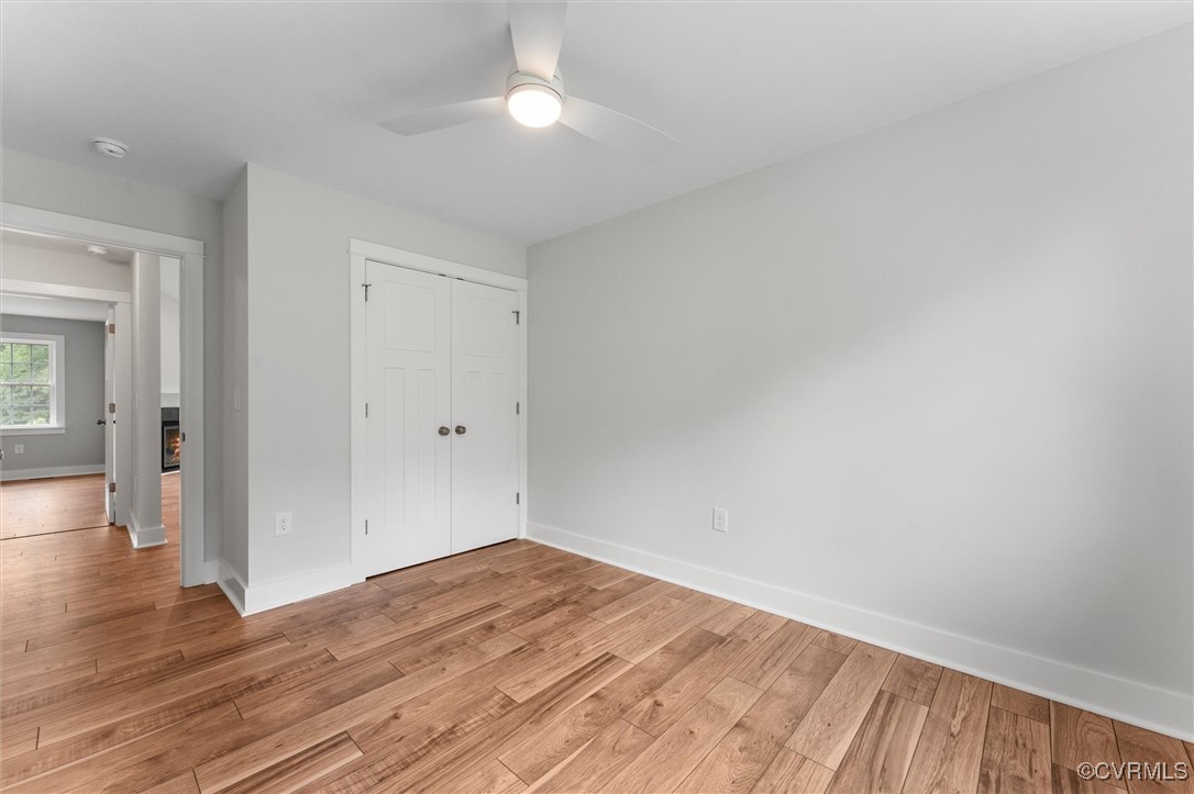 699 Trimmers Shop Road West Point, VA 23181 - Photo 17 of 27 Unfurnished bedroom with light wood finished floor