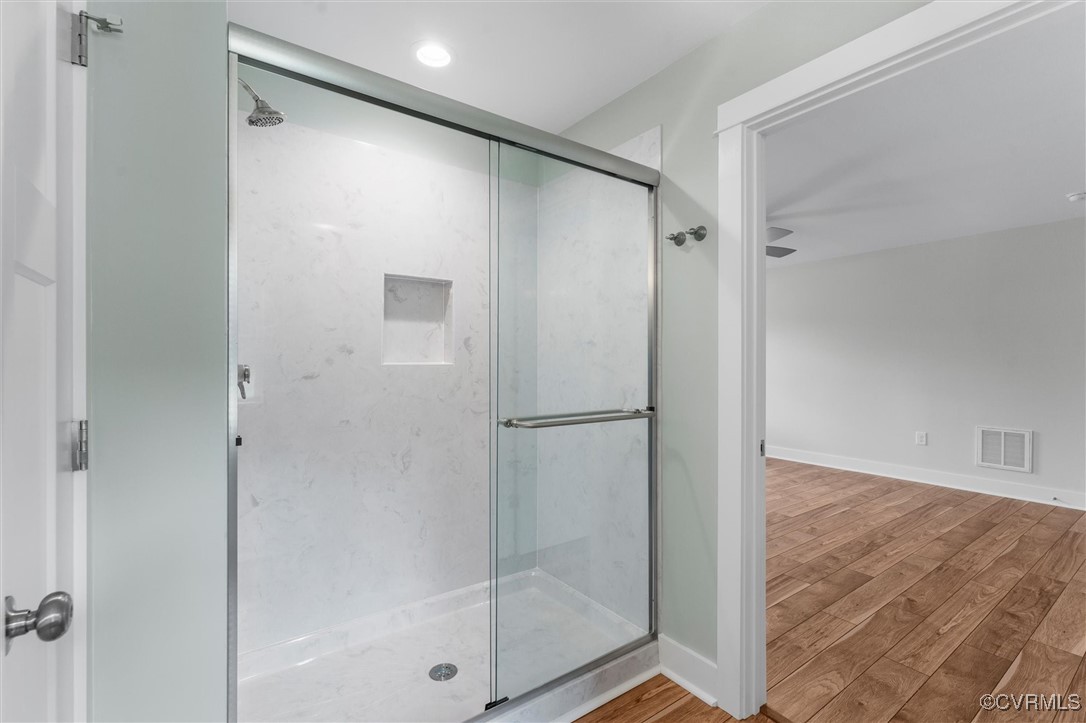 699 Trimmers Shop Road West Point, VA 23181 - Photo 26 of 27 Full bath featuring a shower stall and wood finish