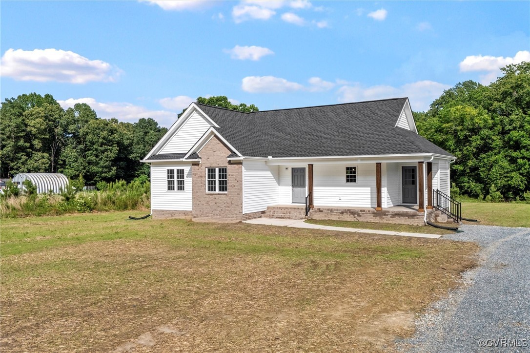 699 Trimmers Shop Road West Point, VA 23181 - Photo 3 of 27 View of front of house with a shingled roof, a fro