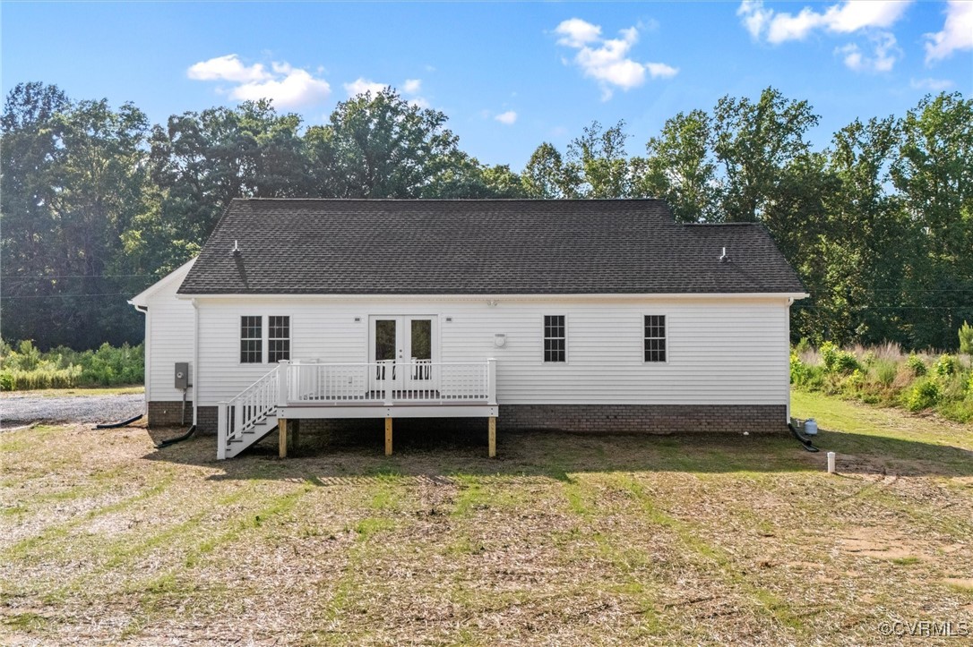699 Trimmers Shop Road West Point, VA 23181 - Photo 5 of 27 Rear view of house featuring a deck, french doors,