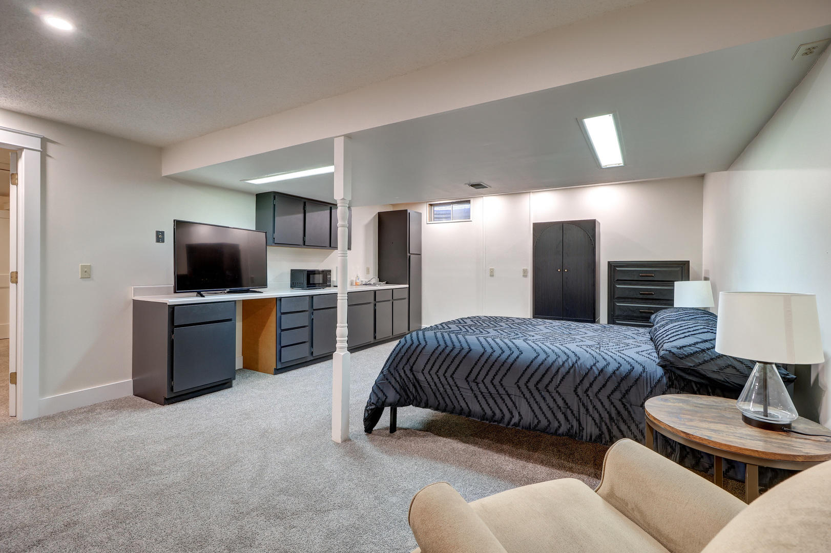 12749 Lawrence Road Sterling, IL 61081 - Photo 29 of 45 a living room with furniture and a flat screen tv