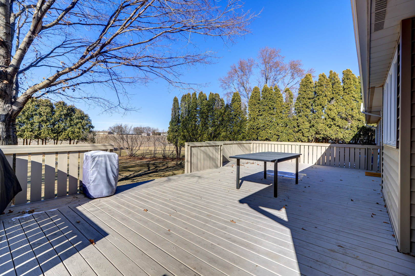 12749 Lawrence Road Sterling, IL 61081 - Photo 34 of 45 a view of a chairs and table on the wooden deck