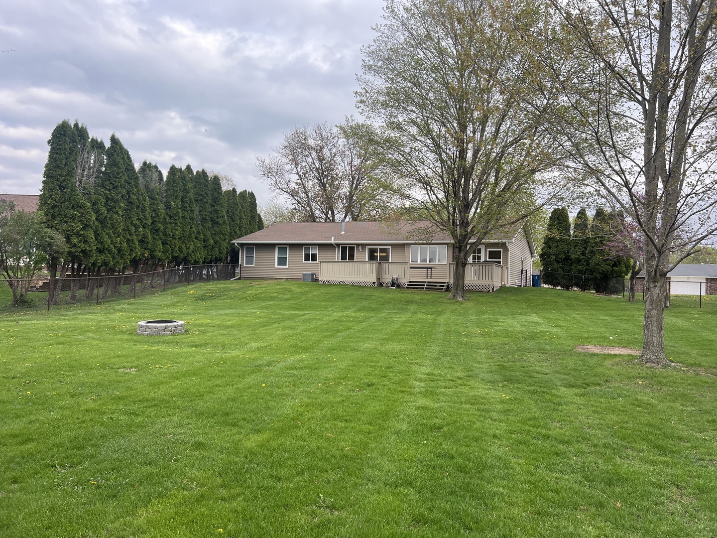 12749 Lawrence Road Sterling, IL 61081 - Photo 37 of 45 a house view with swimming pool in front of it