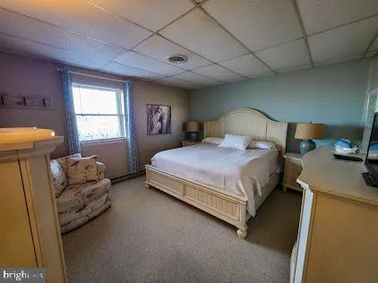 a aerial view of a house with a ocean view