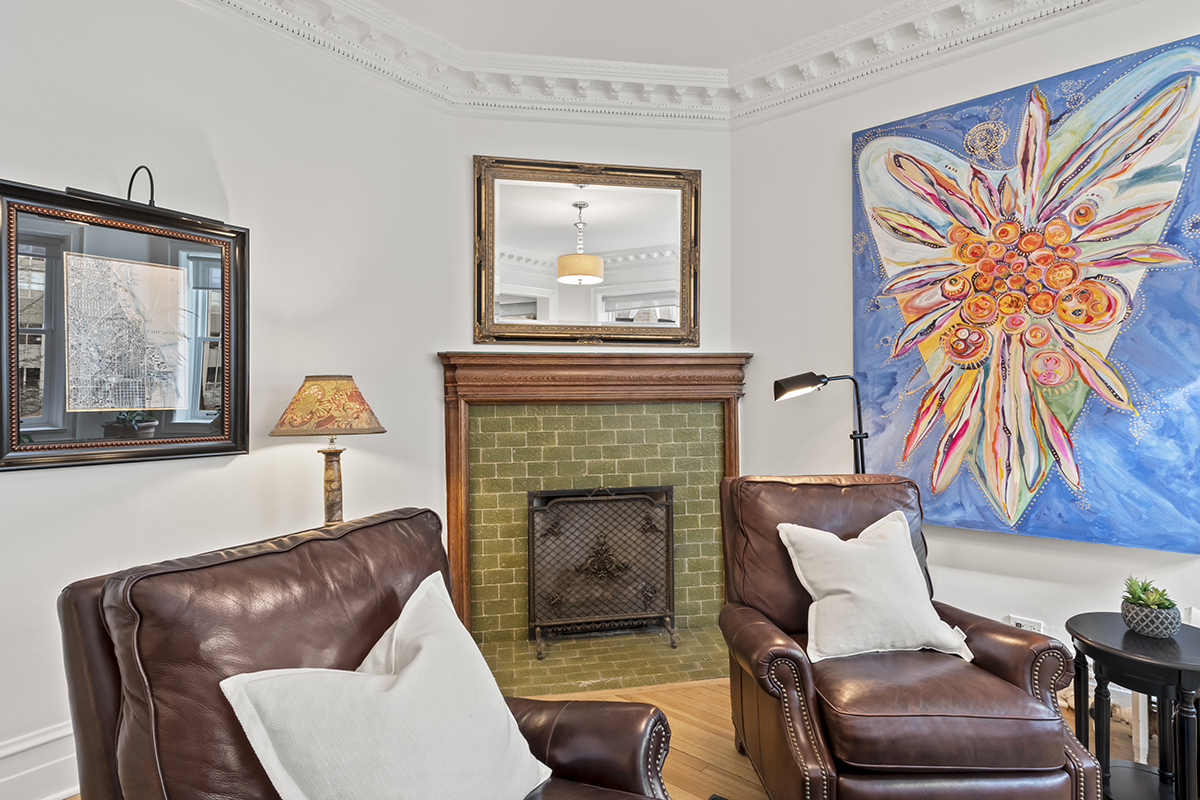 670 West Irving Park Road, Unit G6 Chicago, IL 60613 - Photo 15 of 38 a living room with furniture and a fireplace