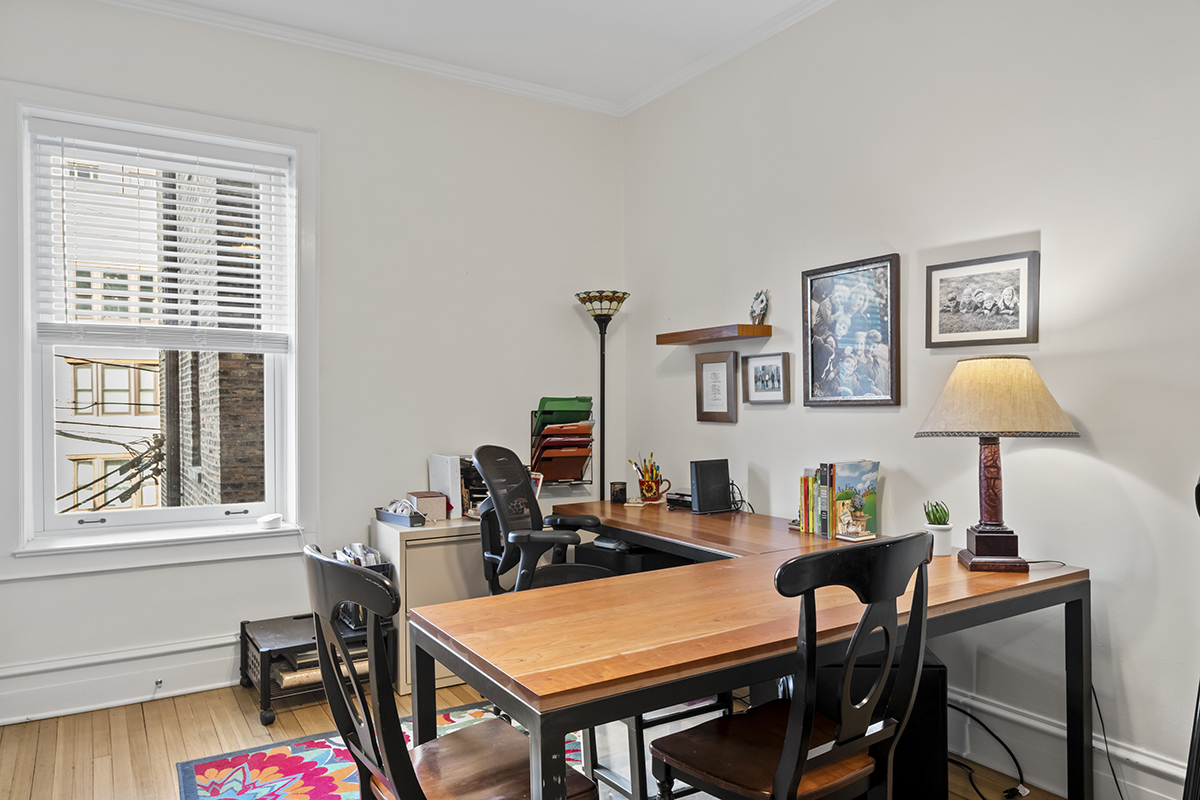 670 West Irving Park Road, Unit G6 Chicago, IL 60613 - Photo 26 of 38 a view of a workspace with furniture and a window