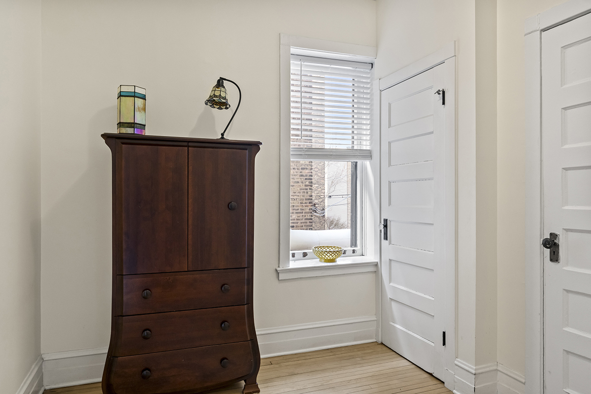 670 West Irving Park Road, Unit G6 Chicago, IL 60613 - Photo 29 of 38 a view of a hallway with closet