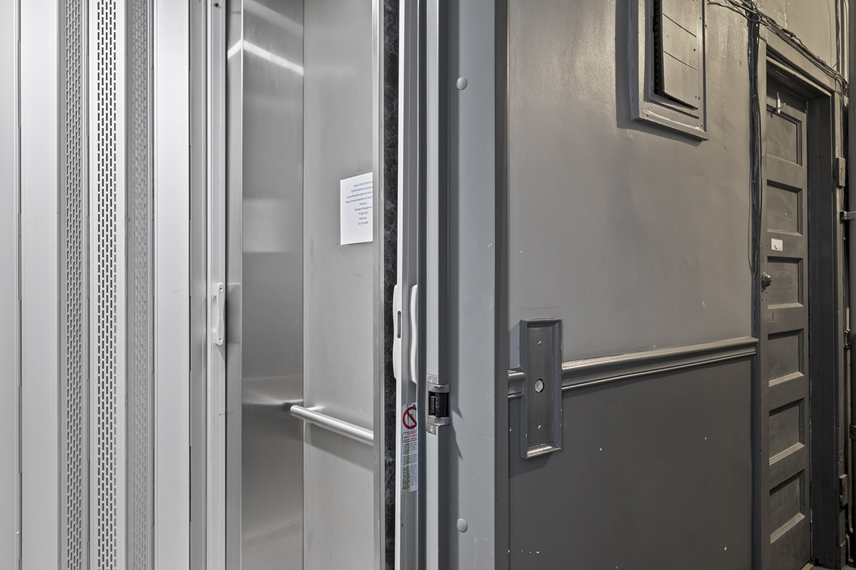 670 West Irving Park Road, Unit G6 Chicago, IL 60613 - Photo 32 of 38 a bathroom with a glass shower door