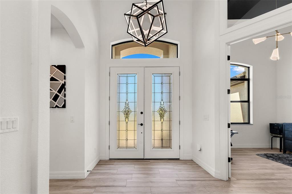 48 Master Drive Placida, FL 33946 - Photo 4 of 61 a view of an entryway with wooden floor
