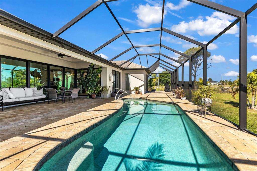 48 Master Drive Placida, FL 33946 - Photo 44 of 61 a view of swimming pool with patio