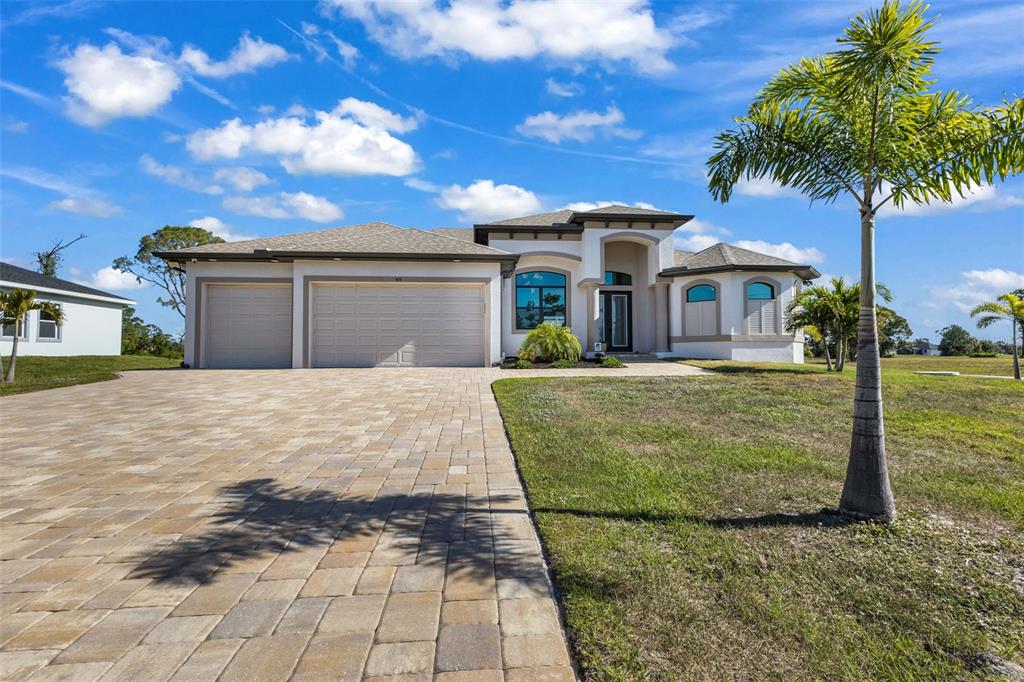 48 Master Drive Placida, FL 33946 - Photo 50 of 61 a front view of a house with garden