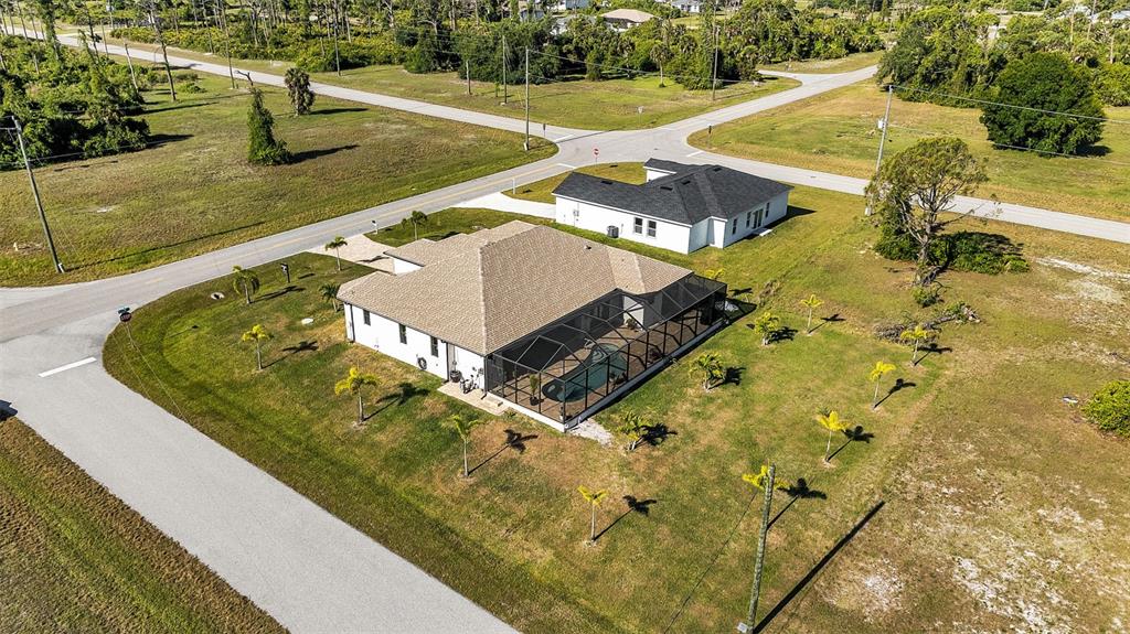 48 Master Drive Placida, FL 33946 - Photo 57 of 61 a view of a swimming pool with a yard