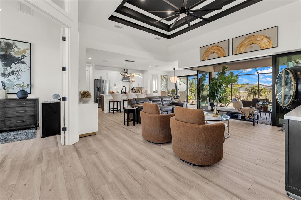 48 Master Drive Placida, FL 33946 - Photo 7 of 61 a living room with furniture and a floor to ceiling window