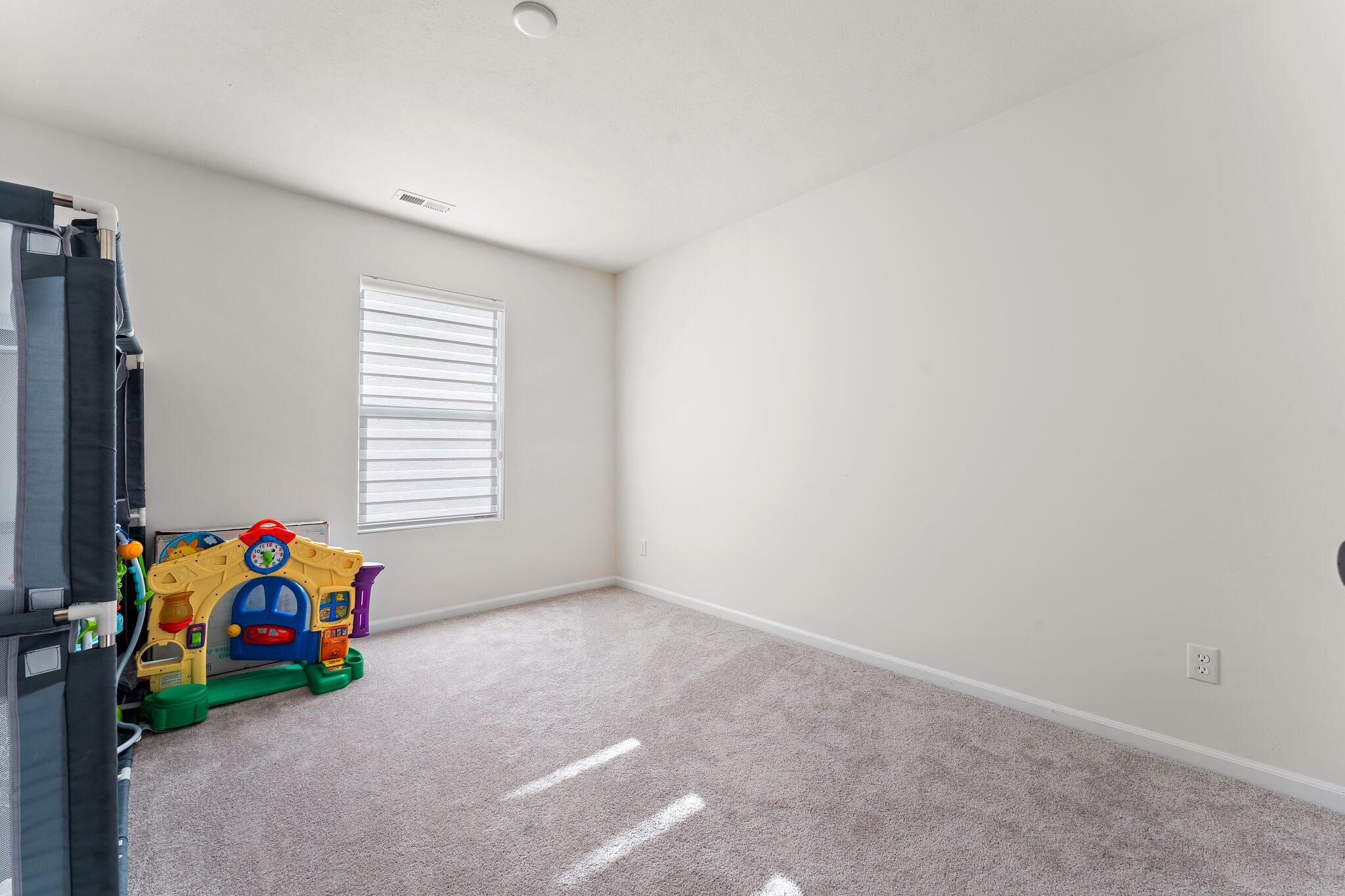 11539 Georgia Place Crown Point, IN 46307 - Photo 21 of 37 a children room with toys and a window