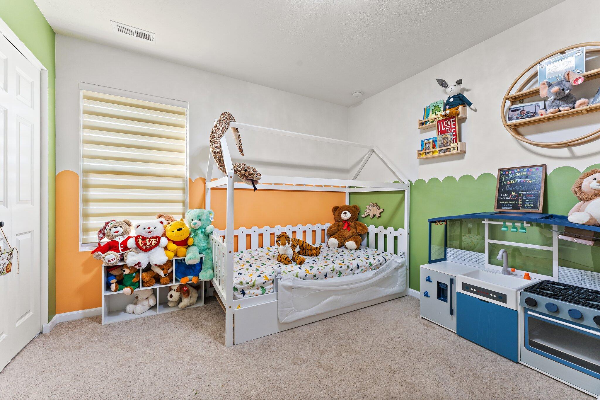 11539 Georgia Place Crown Point, IN 46307 - Photo 22 of 37 a bed room with furniture and a couch