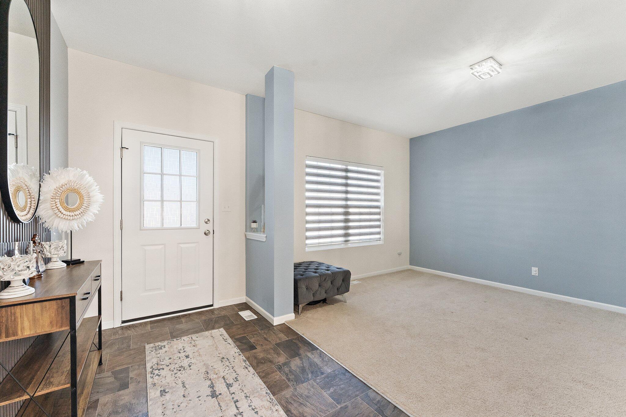 11539 Georgia Place Crown Point, IN 46307 - Photo 5 of 37 a view of an empty room with a window