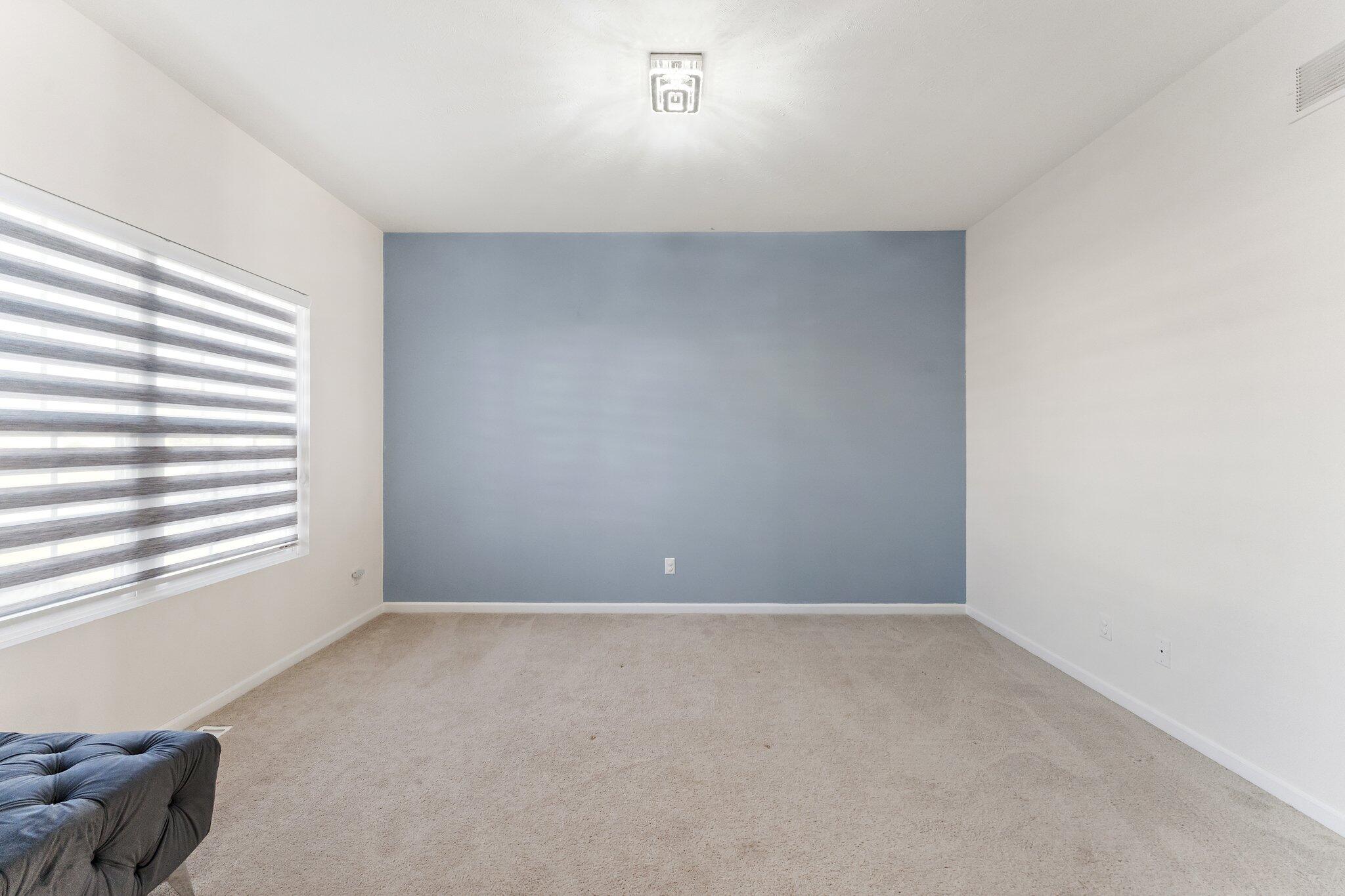 11539 Georgia Place Crown Point, IN 46307 - Photo 6 of 37 a view of an empty room with a window