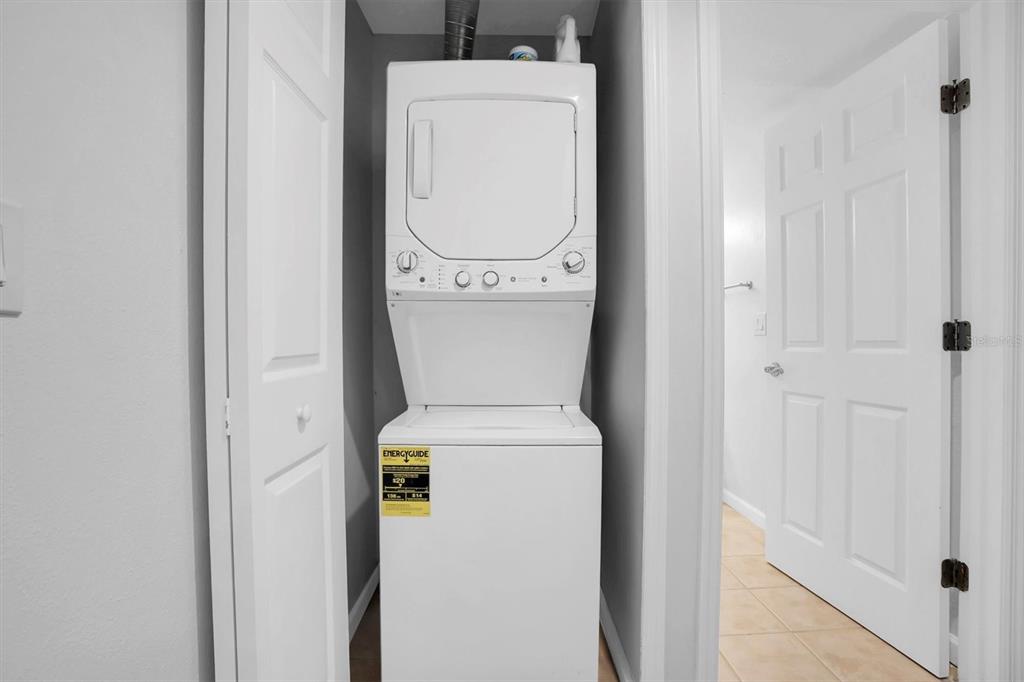 2500 Winding Creek Boulevard, Unit A104 Clearwater, FL 33761 - Photo 22 of 31 a utility room with dryer and washer