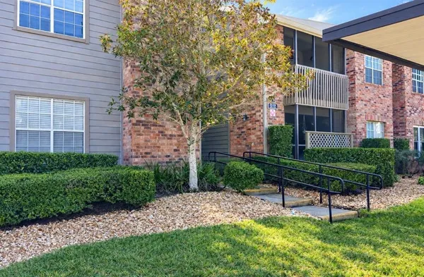 a view of a porch with furniture