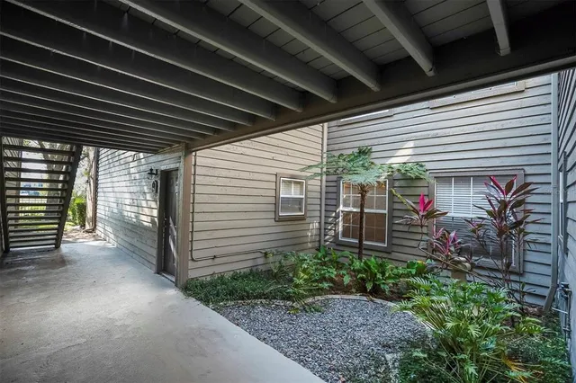 a view of a porch with furniture