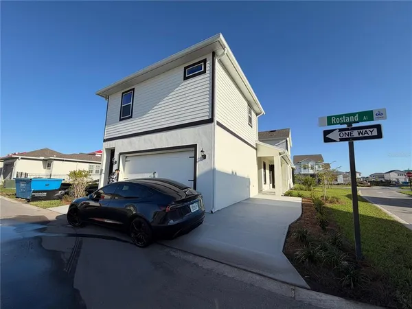 a car parked in front of a house