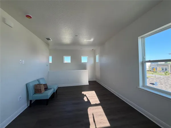 a room with furniture and window