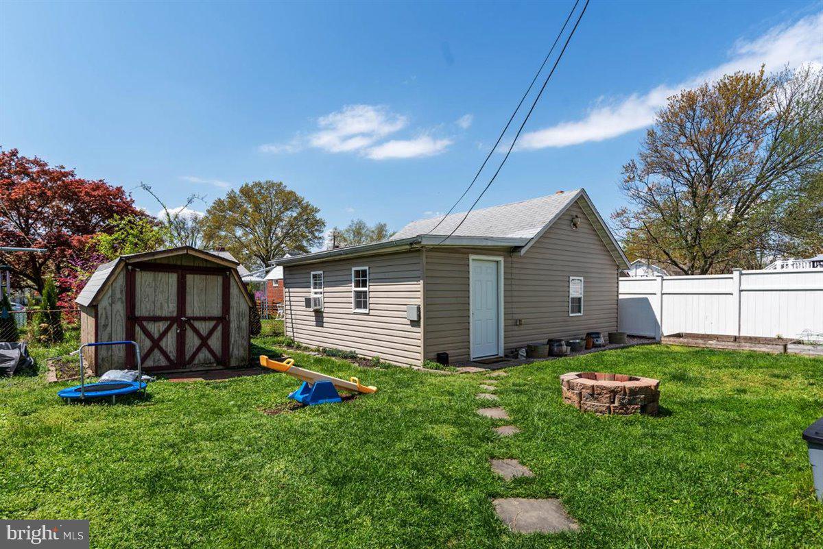 8426 Garden Road Pasadena, MD 21122 - Photo 27 of 32 Backyard - view of shed & separate office/workshop