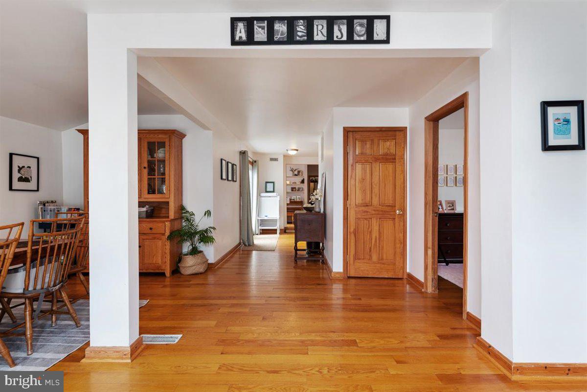 8426 Garden Road Pasadena, MD 21122 - Photo 4 of 32 Foyer - hardwood floors throughout the first floor