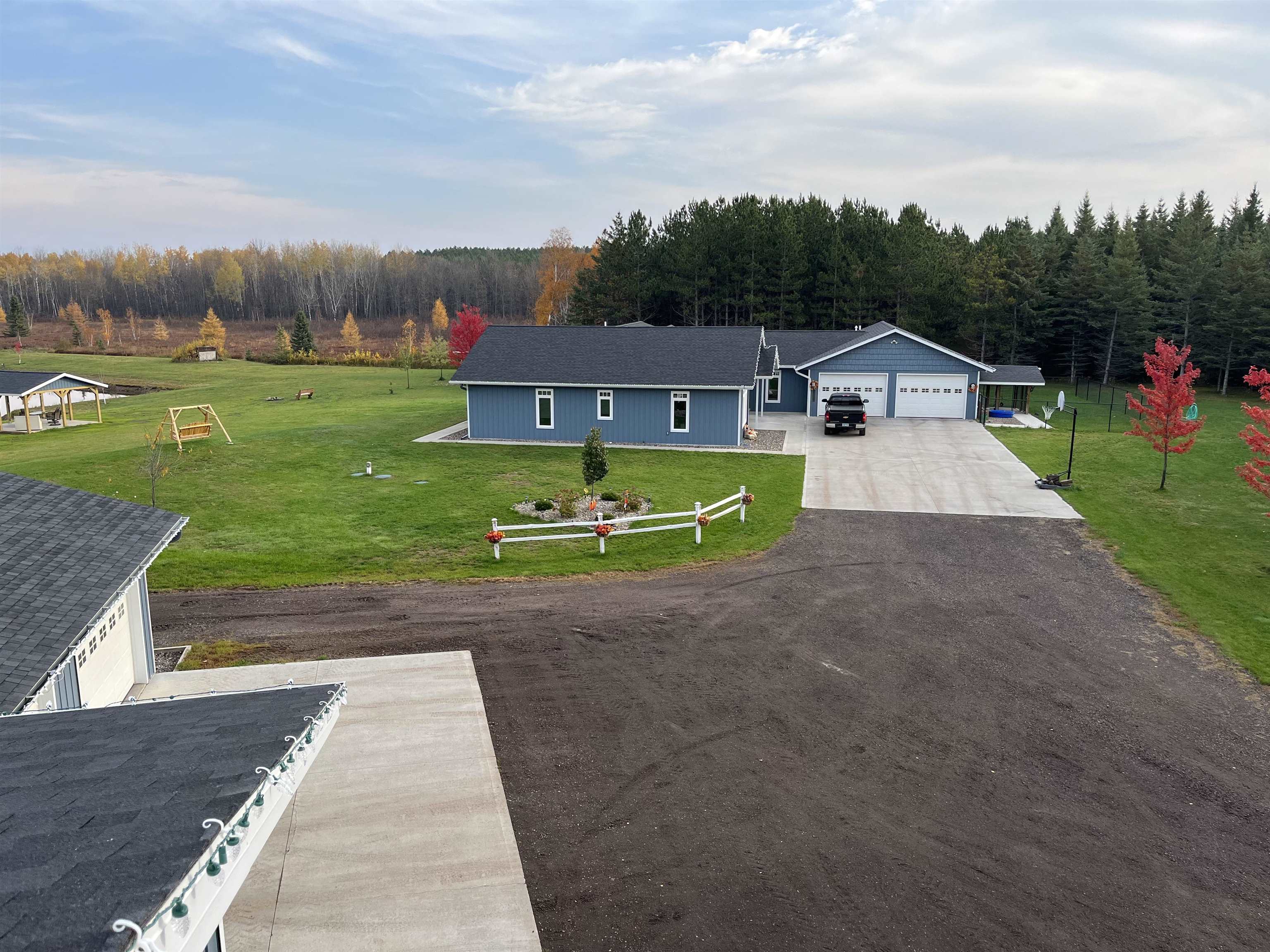 7117 Saginaw Road Saginaw, MN 55779 - Photo 38 of 81 Drone / aerial view with a forest view