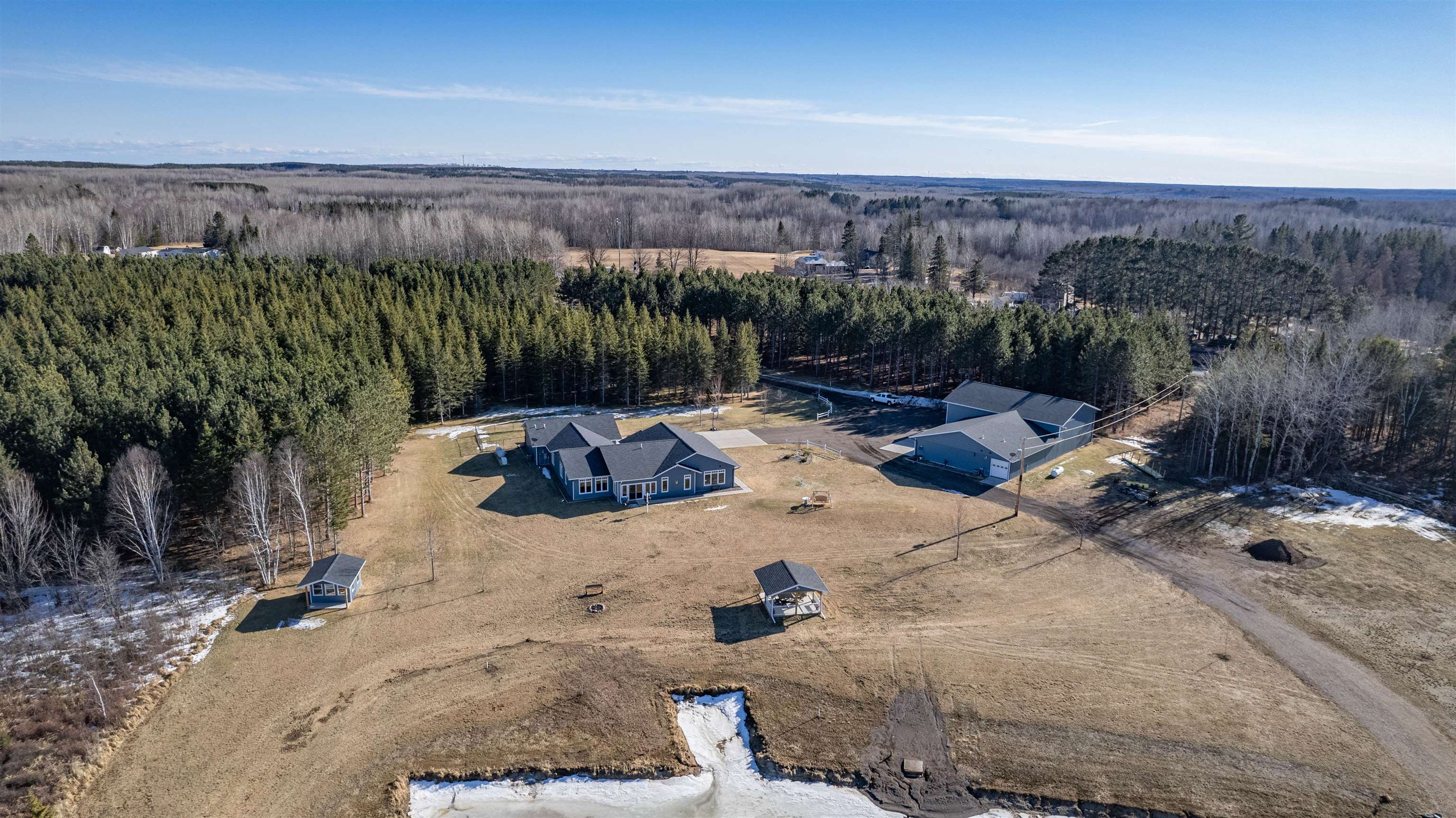 7117 Saginaw Road Saginaw, MN 55779 - Photo 50 of 81 Drone / aerial view with a forest view