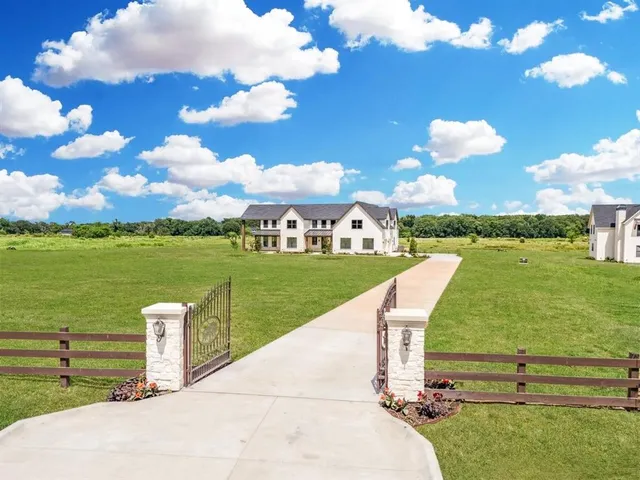 a view of a golf course with a lake