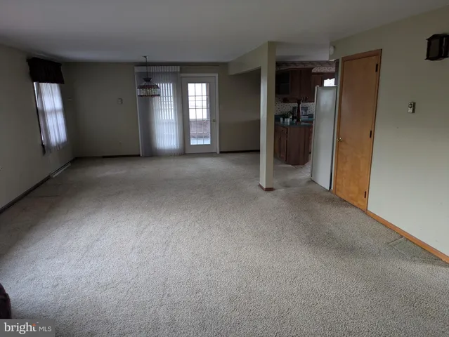 a view of a livingroom with a furniture
