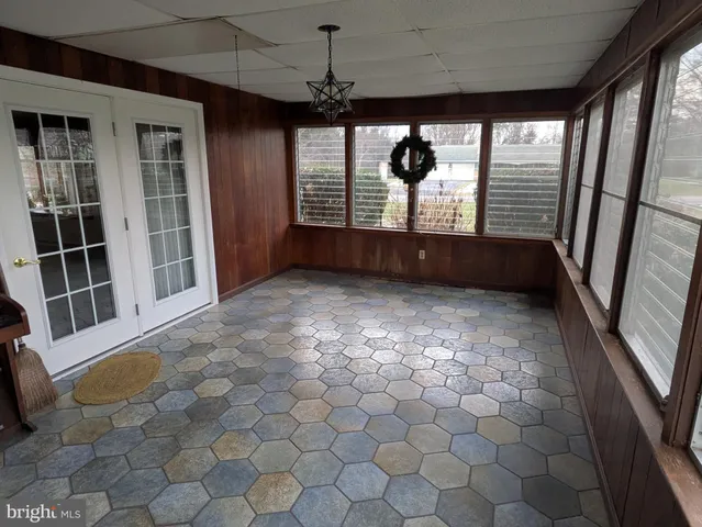 an empty room with windows