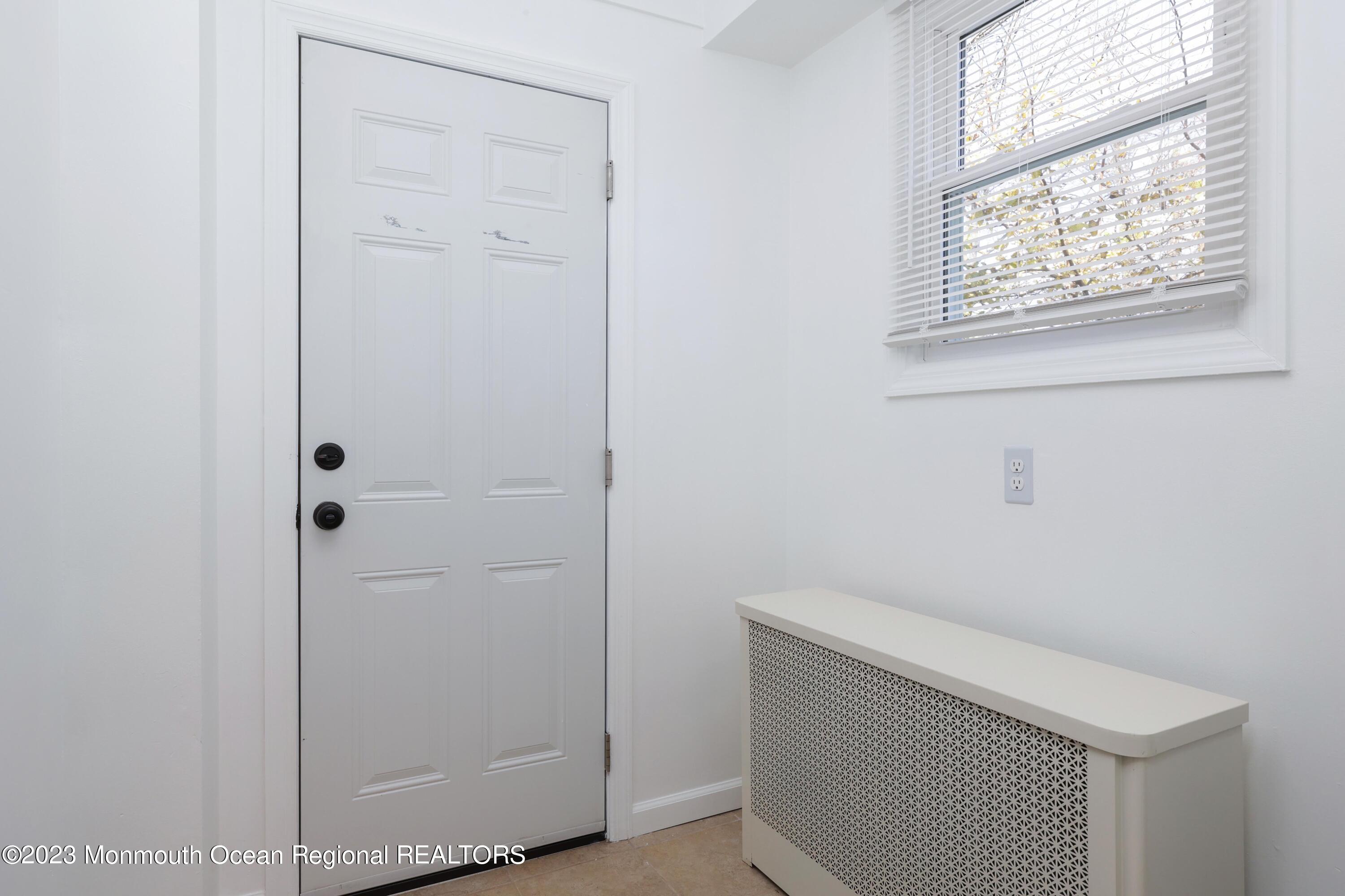 278 Broad Street, Unit FIRST Matawan, NJ 07747 - Photo 8 of 26 a bathroom with a shower