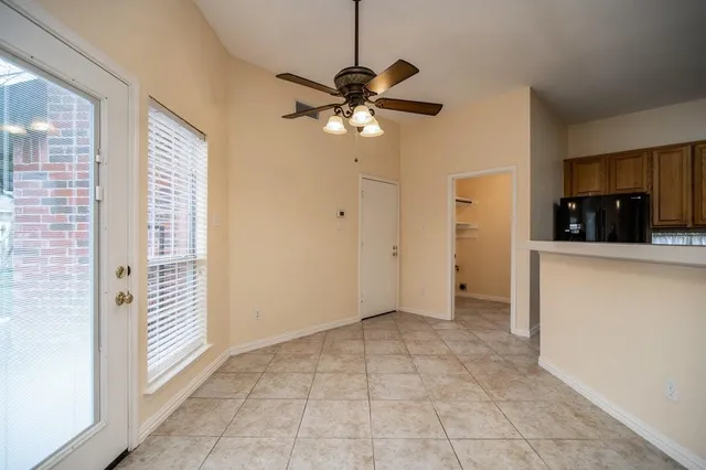 a view of a kitchen with a sink and dishwasher