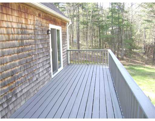 95 Tripps Corner Road Exeter, RI 02822 - Photo 17 of 20 Patio/Deck. Newly Painted 32 Ft Deck overlooking the Private Wooded Back Yard