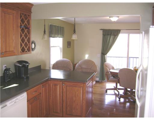 95 Tripps Corner Road Exeter, RI 02822 - Photo 3 of 20 Kitchen. Kitchen has a Breakfast Bar and Built-in Wine Rack