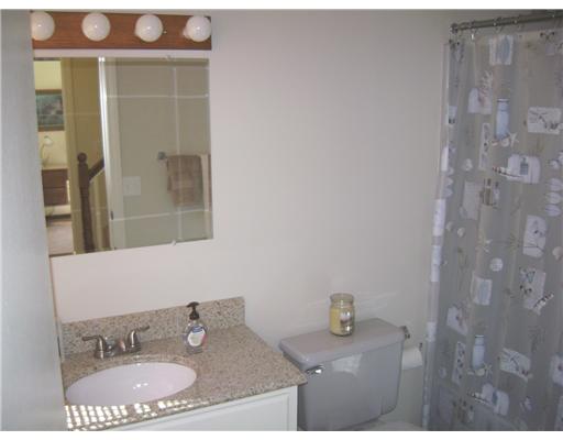 95 Tripps Corner Road Exeter, RI 02822 - Photo 7 of 20 Bathroom. First Floor Bath has a Ceramic tile floor and Solid Surface counter