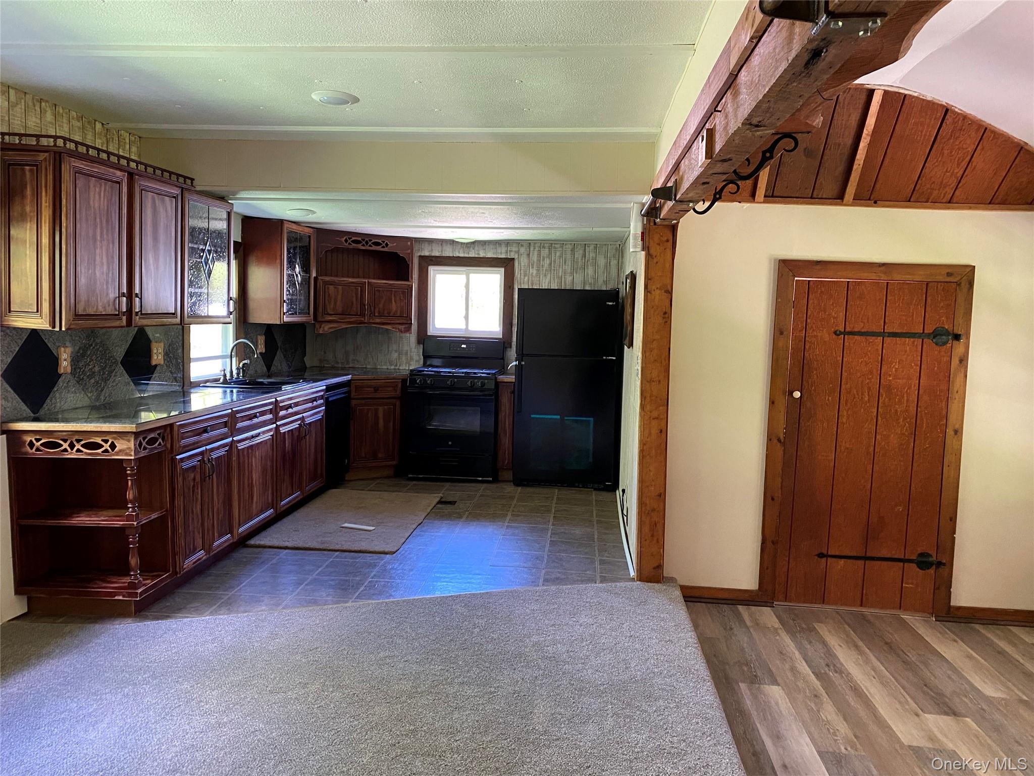 74 Lamoree Road Rhinebeck, NY 12572 - Photo 14 of 22 a kitchen with stainless steel appliances granite countertop a stove a sink and a refrigerator