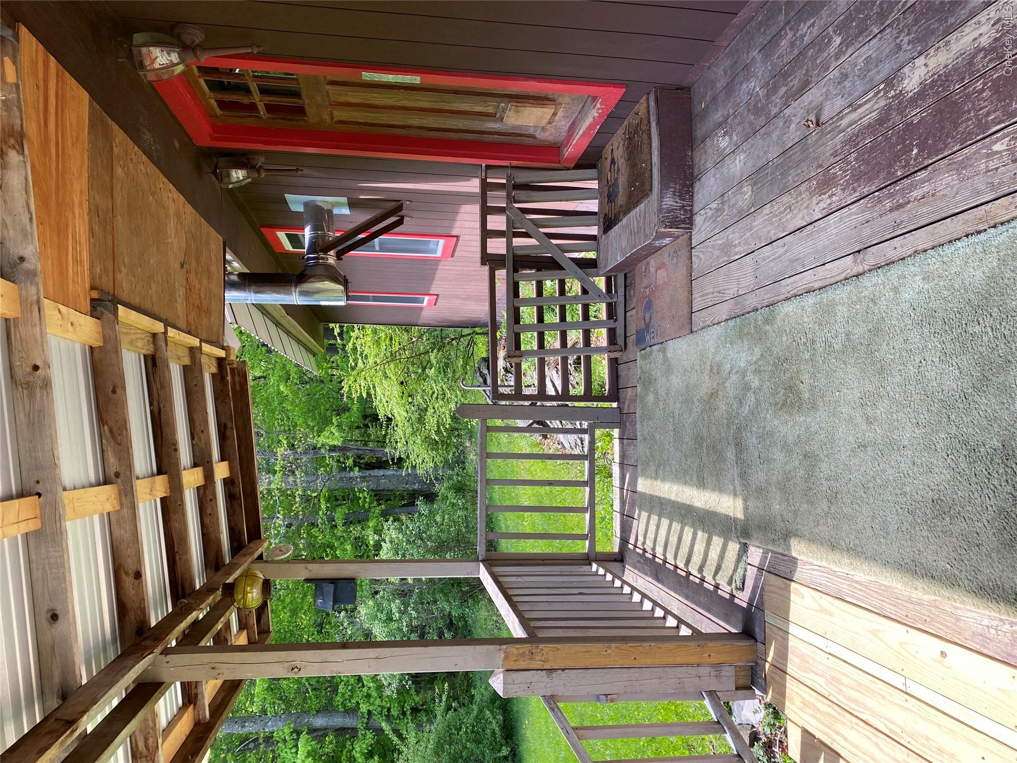 74 Lamoree Road Rhinebeck, NY 12572 - Photo 17 of 22 a view of porch with a bench