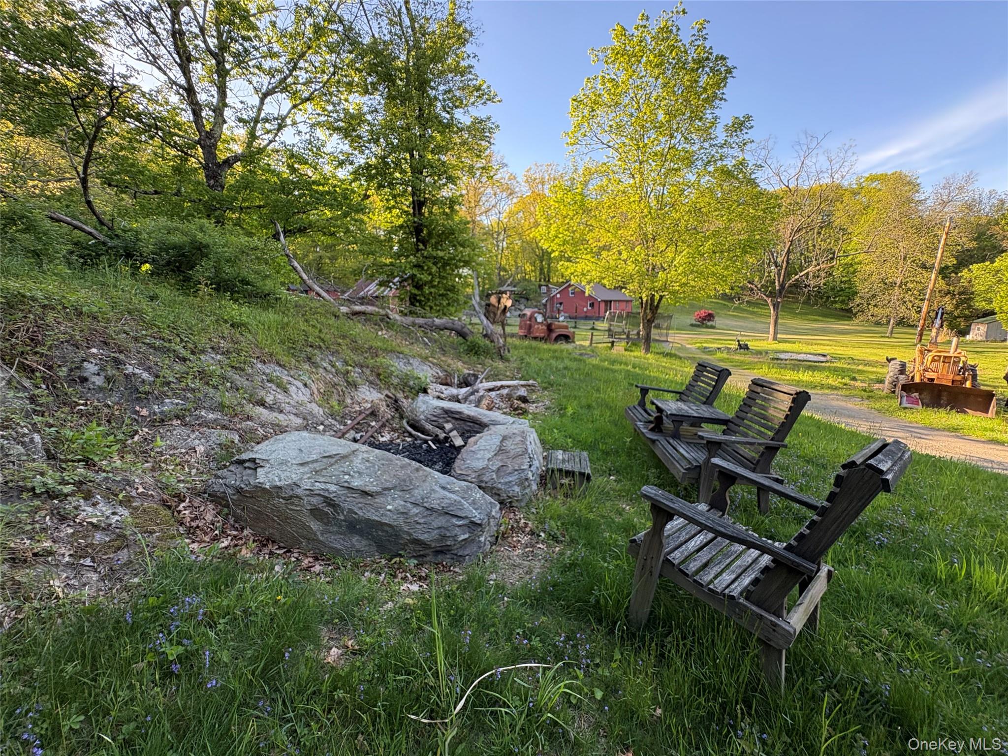 74 Lamoree Road Rhinebeck, NY 12572 - Photo 18 of 22 a view of a backyard with sitting area