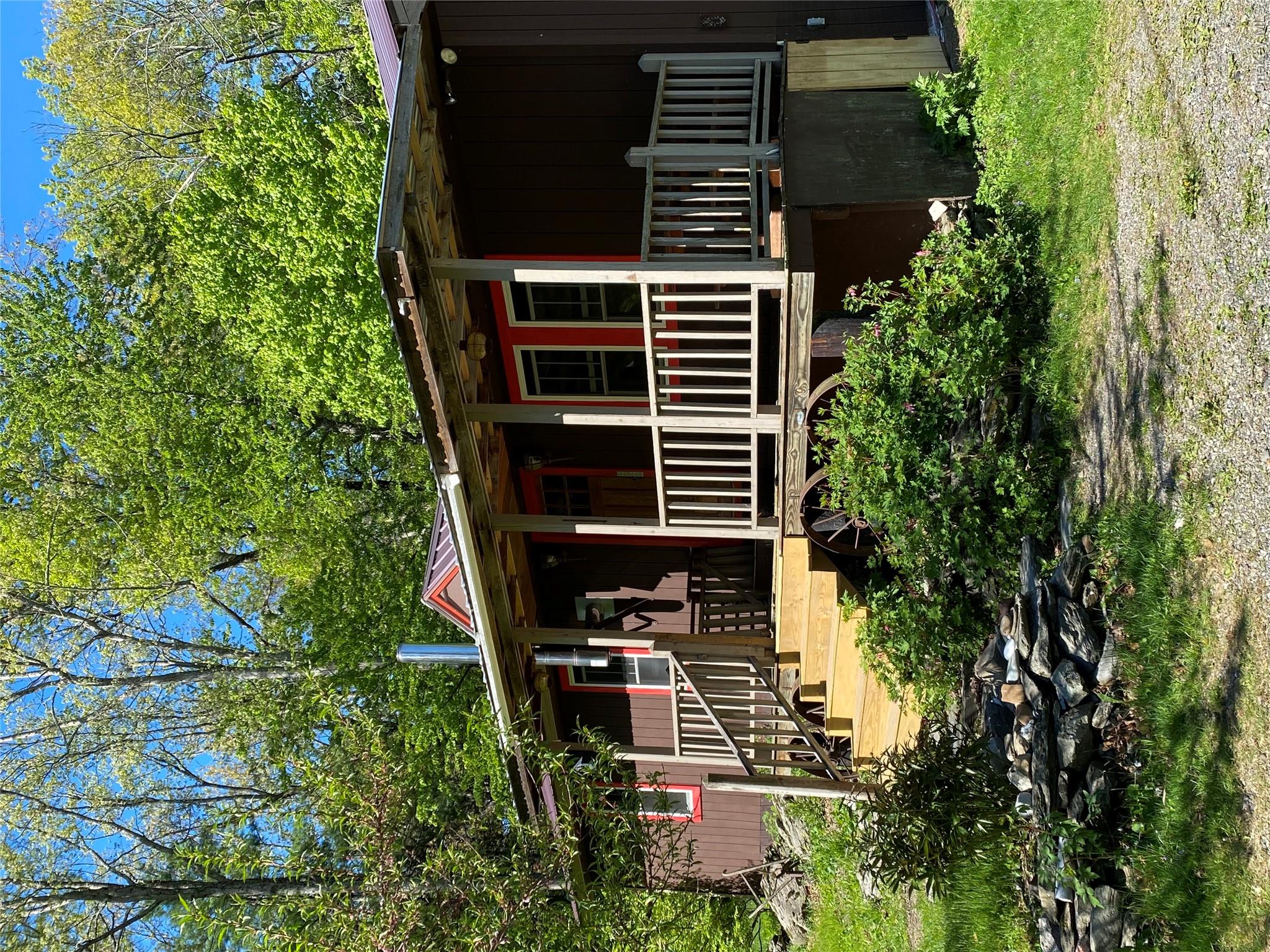 74 Lamoree Road Rhinebeck, NY 12572 - Photo 5 of 22 front view of a house with a small yard