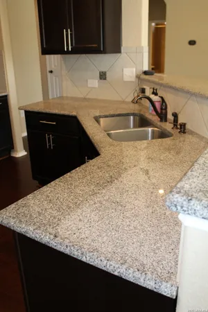 a close view of sink and microwave